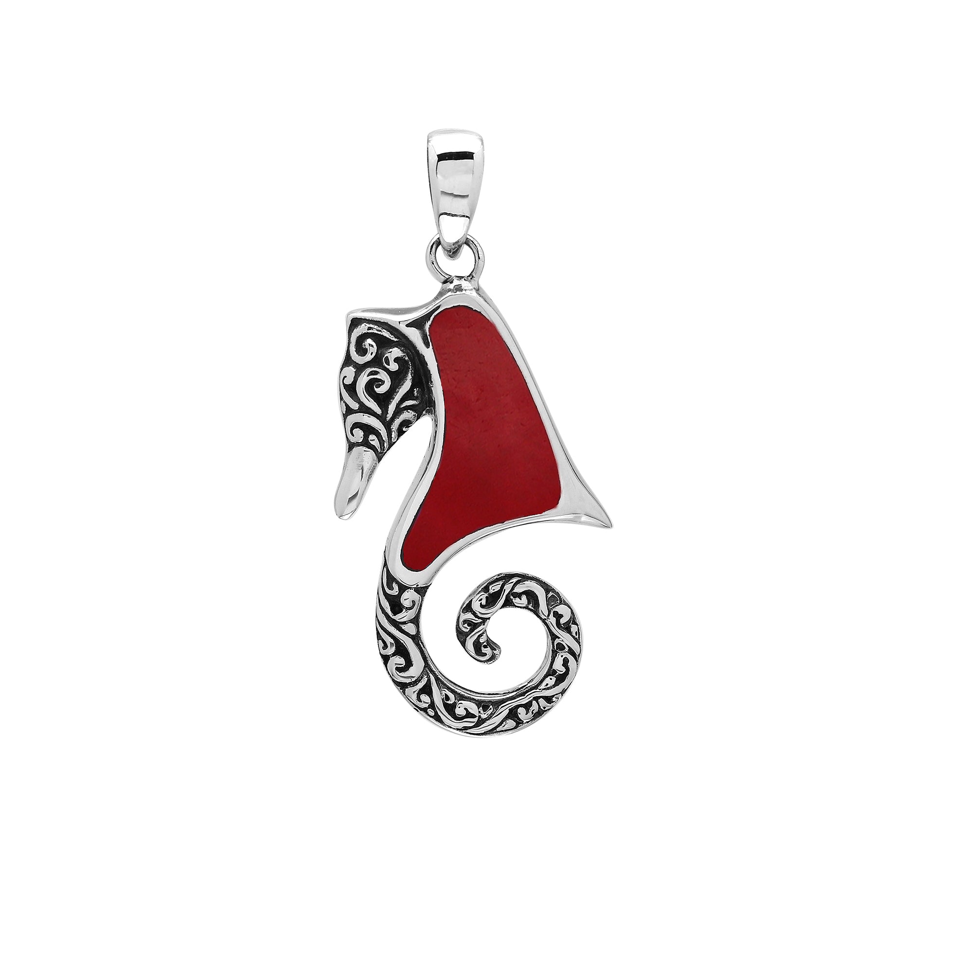 Bold sterling silver seahorse pendant with coral inlay, artisan-crafted for tropical ocean-inspired style.