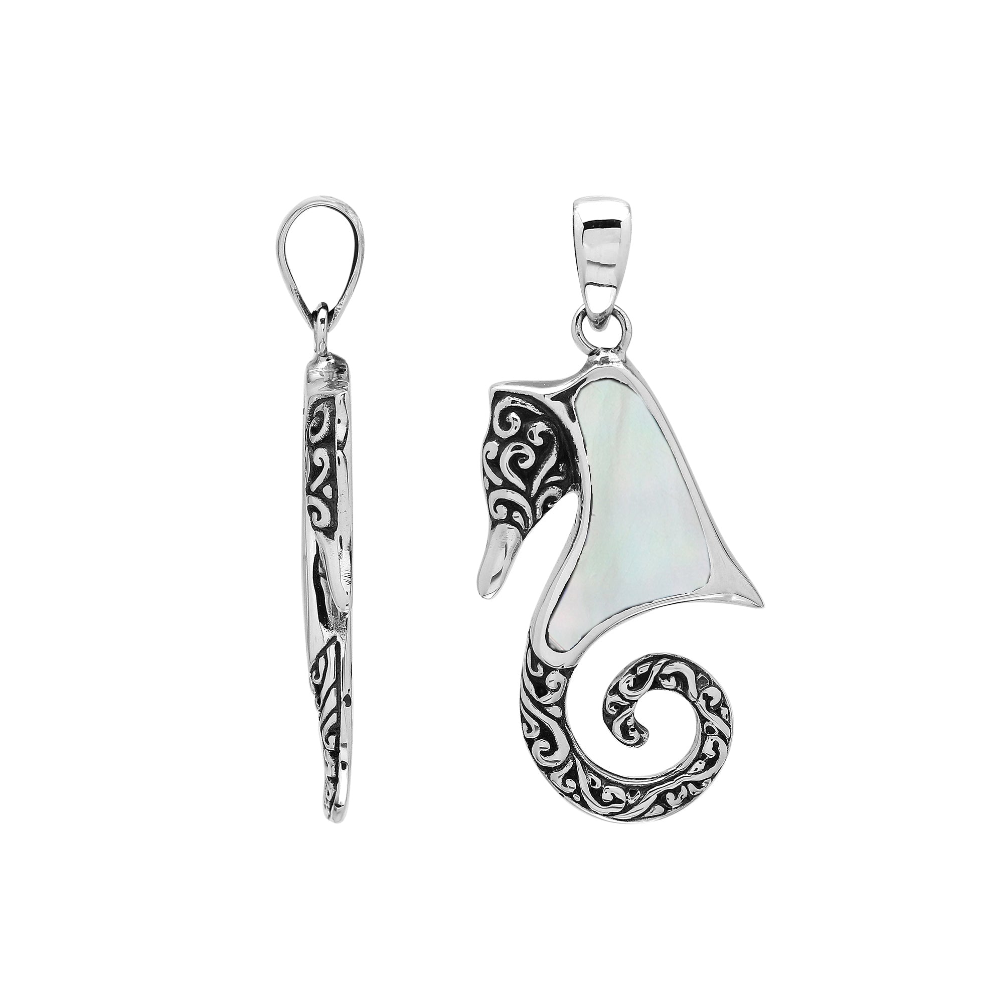 Elegant sterling silver seahorse pendant with luminous Mother of Pearl inlay, artisan-crafted for tropical ocean-inspired style.
