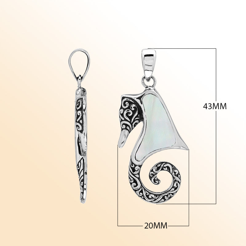 Elegant sterling silver seahorse pendant with luminous Mother of Pearl inlay, artisan-crafted for tropical ocean-inspired style.