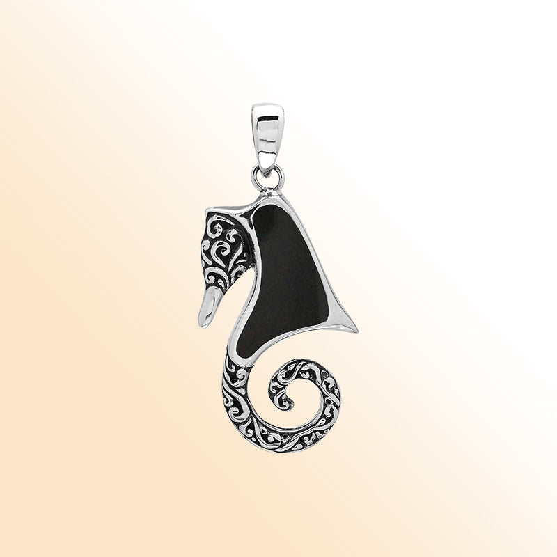 Elegant silver seahorse necklace pendant with black shell, handcrafted in Bali.