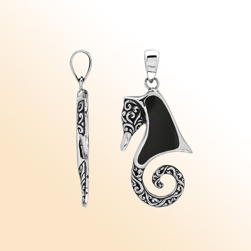 Elegant silver seahorse necklace pendant with black shell, handcrafted in Bali.