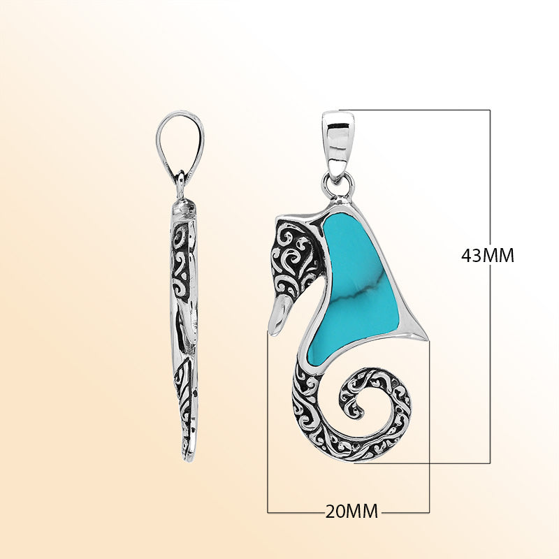 Sterling silver seahorse pendant with turquoise shell inlay, handcrafted in Bali.