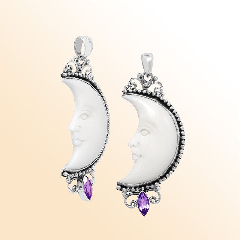 Sterling silver half-moon pendant with carved bone face and amethyst quartz, Balinese design.