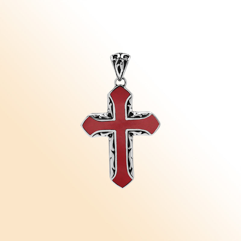 Red coral cross pendant in sterling silver with handcrafted Balinese detailing, religious jewelry.