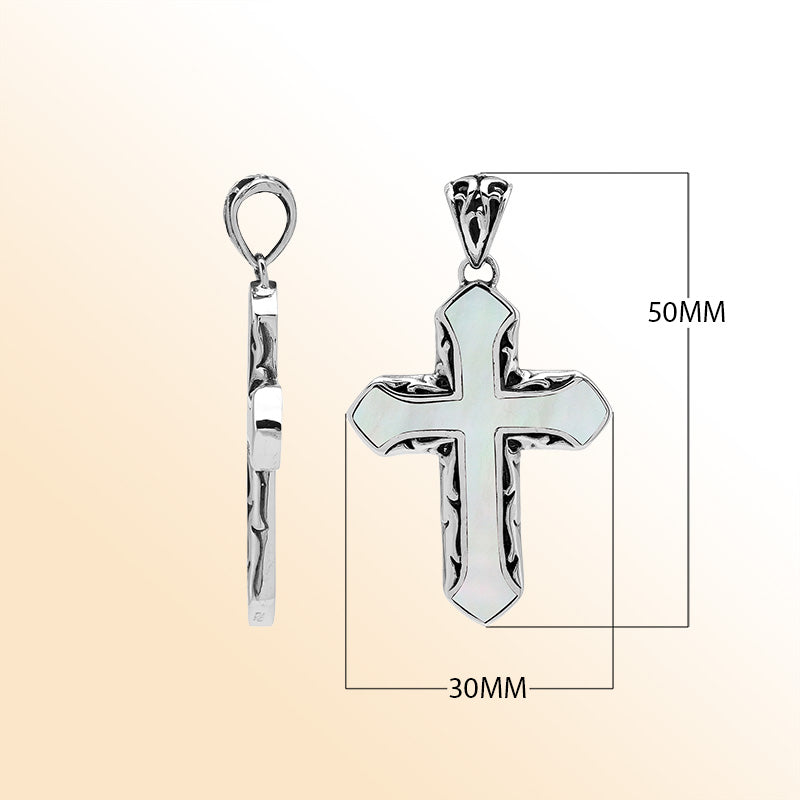 Mother of pearl cross pendant in sterling silver with handcrafted Balinese design, elegant religious jewelry.
