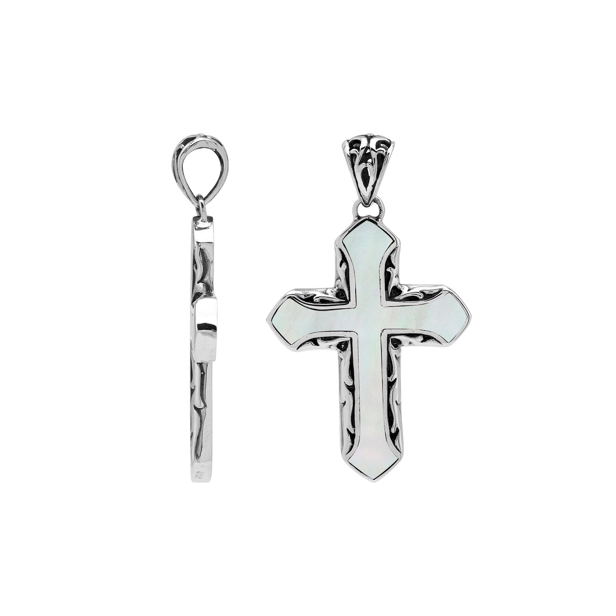 Mother of pearl cross pendant in sterling silver with handcrafted Balinese design, elegant religious jewelry.