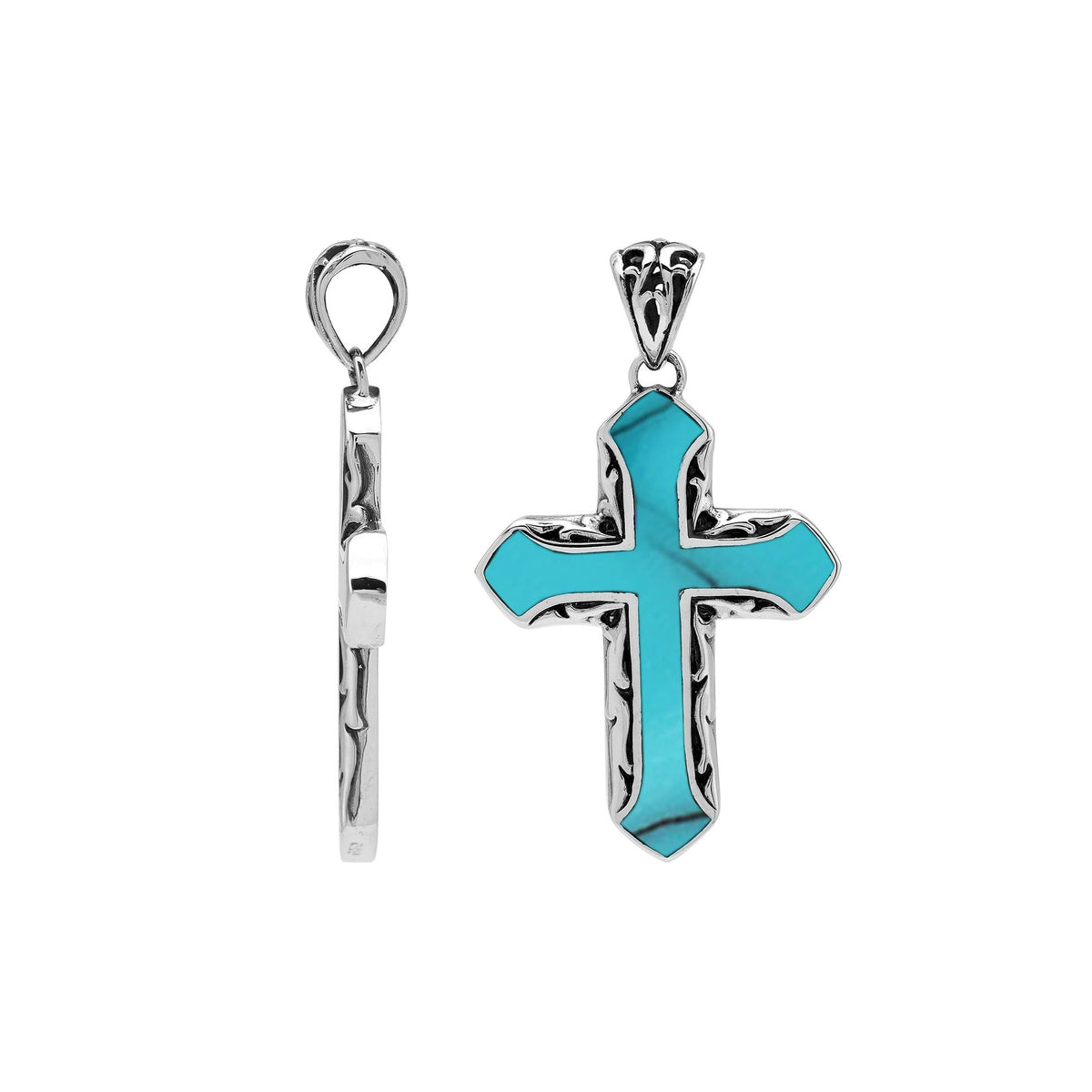 Turquoise cross pendant in sterling silver with handcrafted Balinese design, artisan religious jewelry.