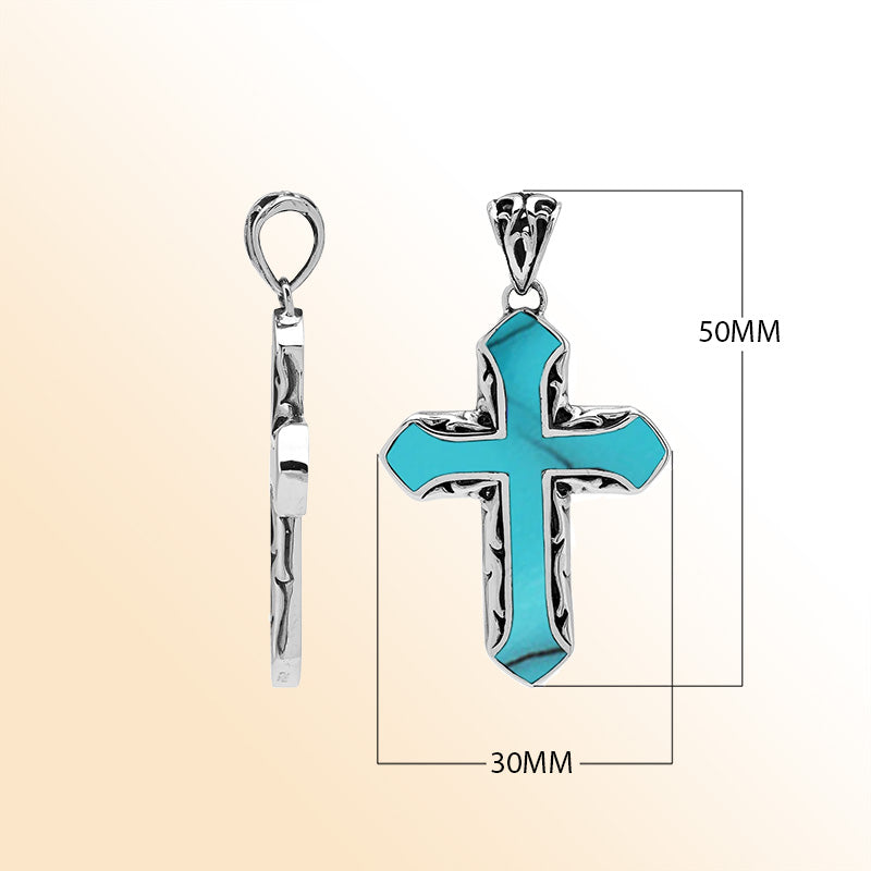 Sterling Silver Cross Pendant With Turquoise Shell Inlay And Intricate Balinese Scrollwork In A Graceful Artisan Design.