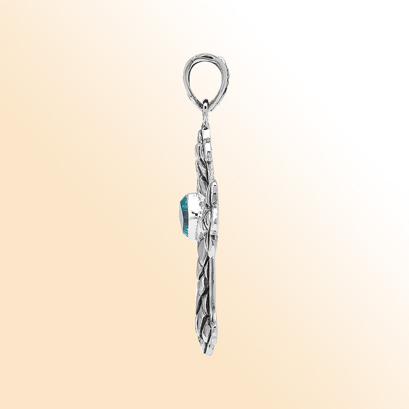 Blue Topaz Quartz cross pendant in sterling silver with handcrafted Balinese silverwork, spiritual artisan jewelry.