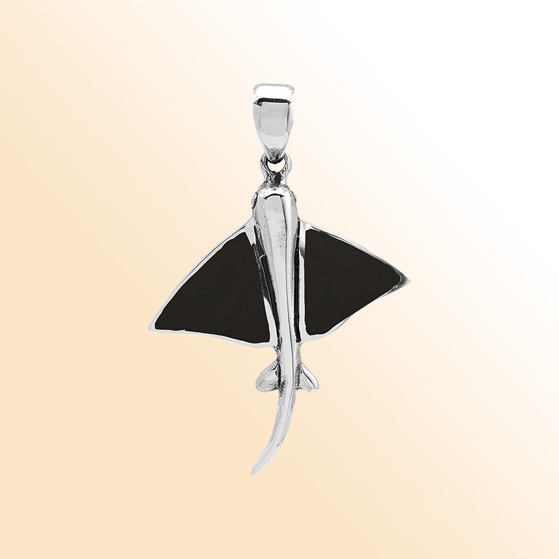 Black shell Mantaray pendant in sterling silver with ocean-inspired Balinese design, handmade jewelry.