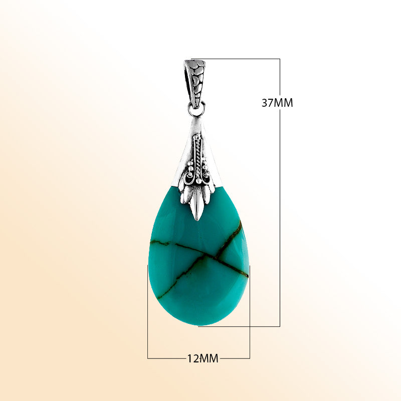 Sterling silver pendant with turquoise shell teardrop, handcrafted Bali-inspired necklace.