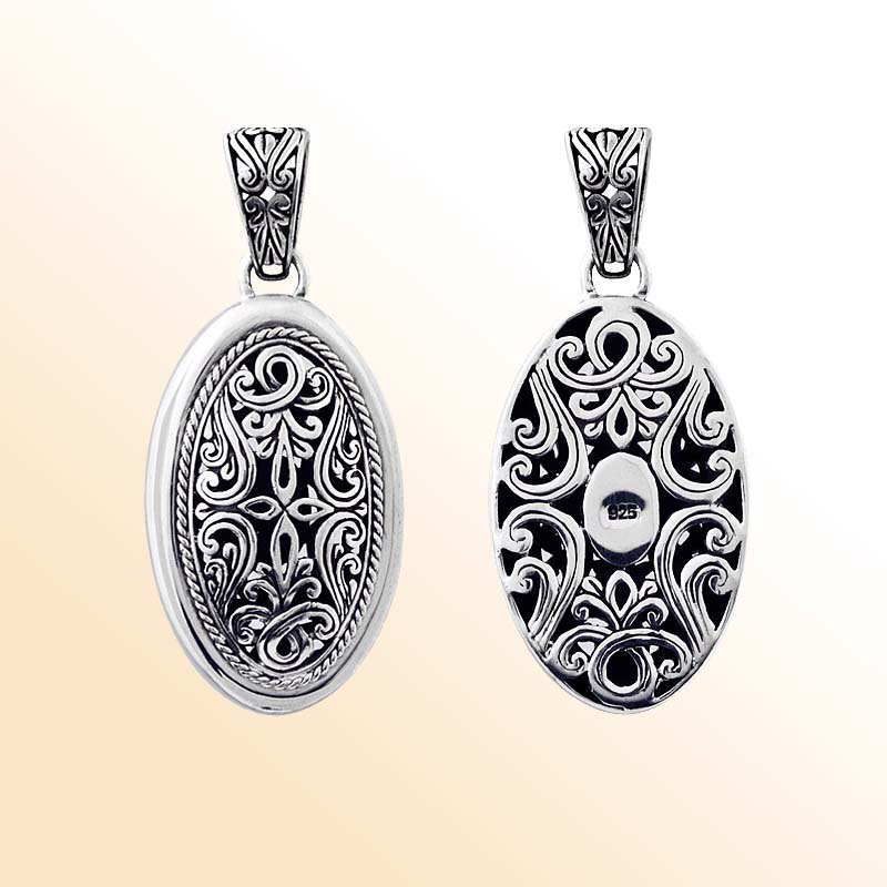 Handcrafted sterling silver oval pendant with Bali carving design, artisan necklace.