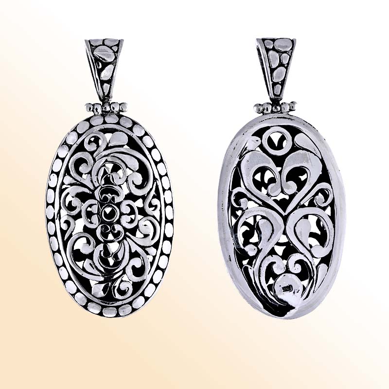 Handmade sterling silver oval filigree pendant with dotted border, artisan Bali jewelry design.