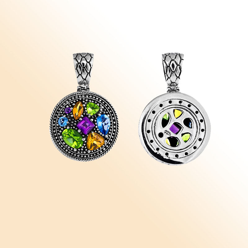 Yin Yang sterling silver pendant with peridot, citrine, blue topaz, and amethyst quartz in artisan design.