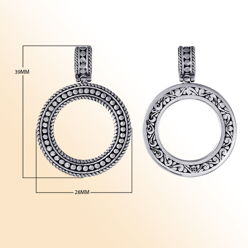 Handmade Bali silver circle pendant with reversible dotted and floral design