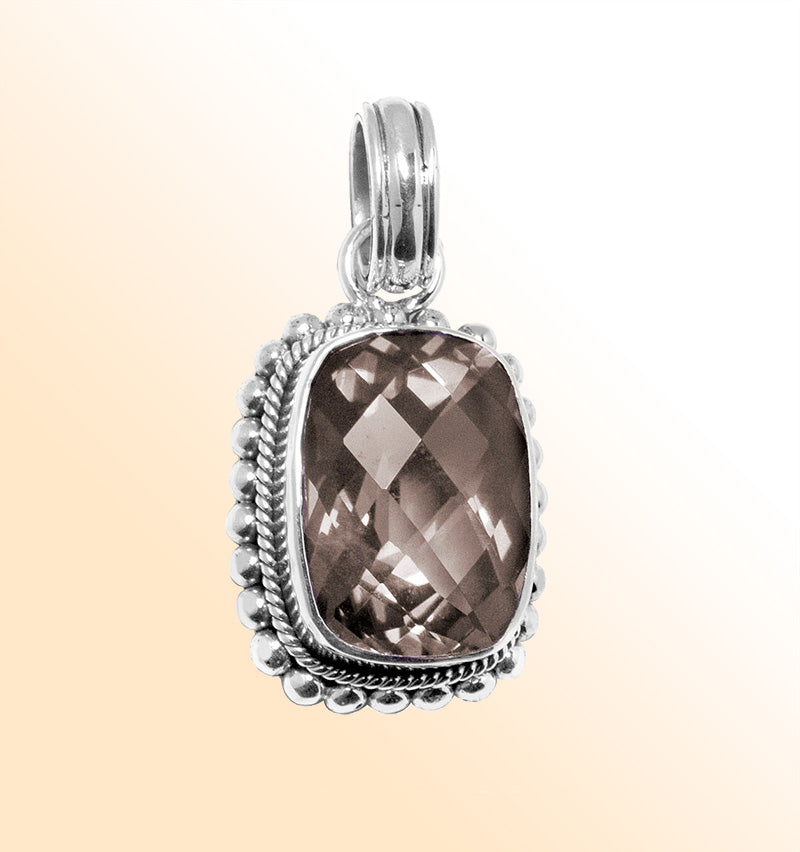 Handmade sterling silver pendant with faceted Smoky Quartz, artisan crafted in Bali