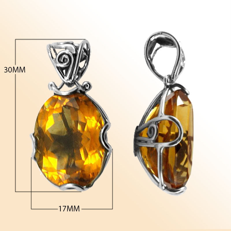 Handmade sterling silver oval pendant with faceted Citrine Quartz, artisan crafted in Bali