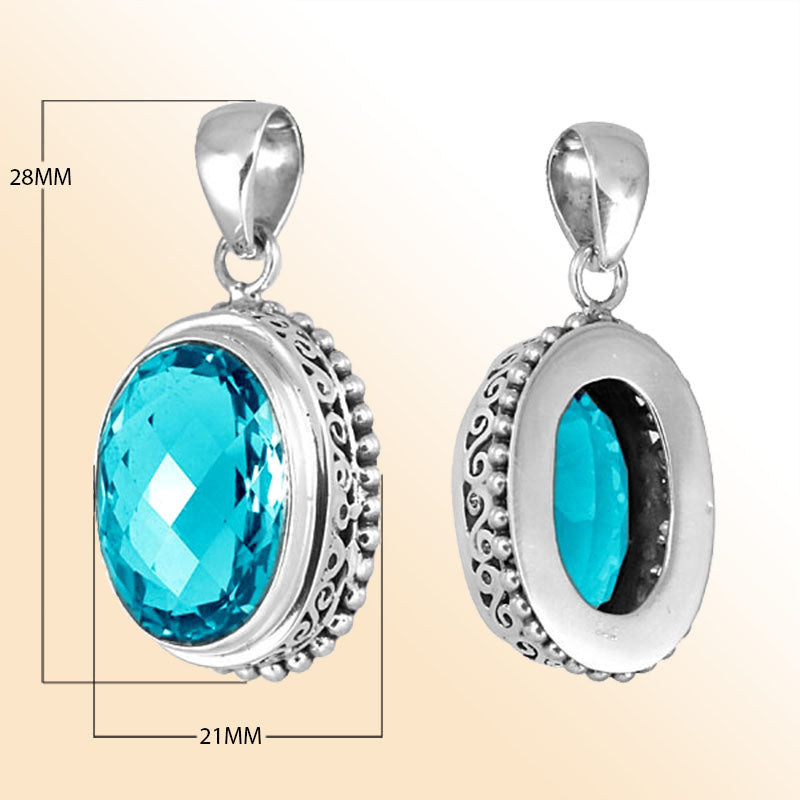 Handmade sterling silver oval pendant with faceted Blue Topaz Quartz, artisan crafted in Bali