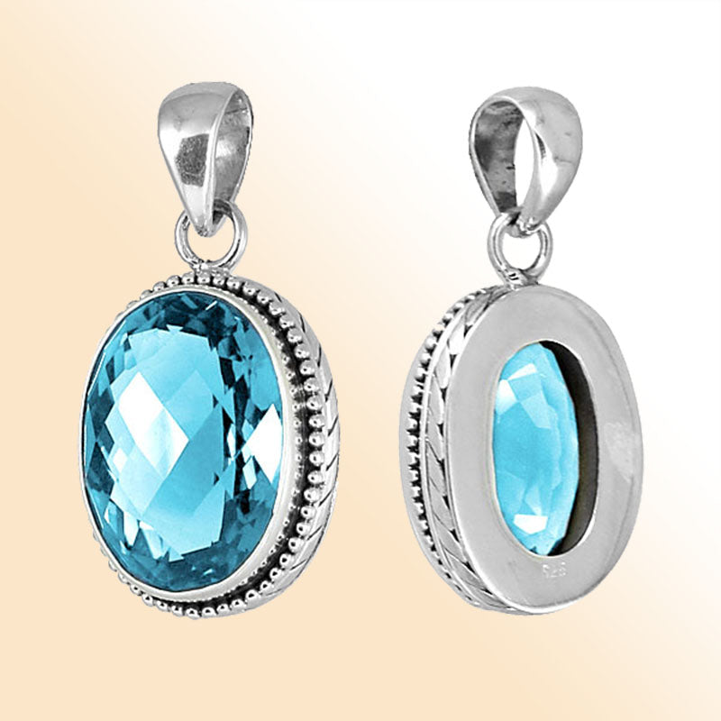 Elegant sterling silver pendant with Blue Topaz Quartz, handcrafted in Bali with oval bezel design.