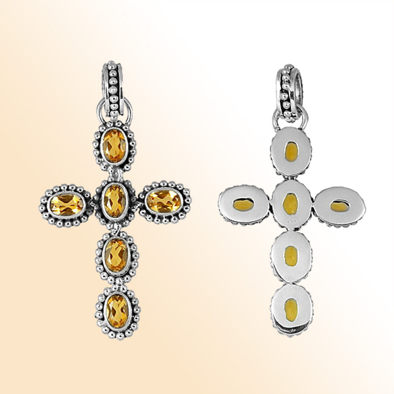 Elegant sterling silver cross pendant with faceted citrine quartz, handcrafted in Bali