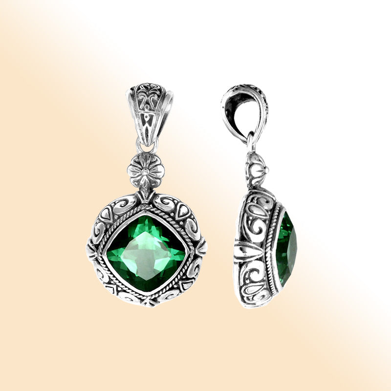 Elegant sterling silver pendant with cushion-cut green quartz, Balinese handcrafted with floral and rope carvings.