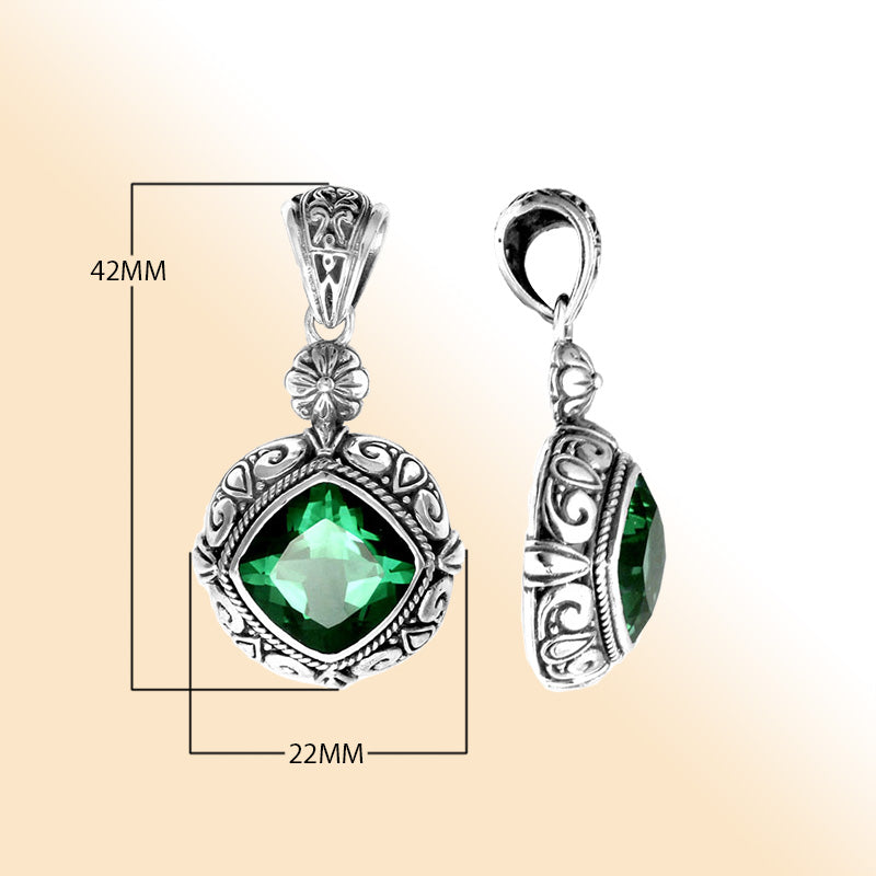 Elegant sterling silver pendant with cushion-cut green quartz, Balinese handcrafted with floral and rope carvings.