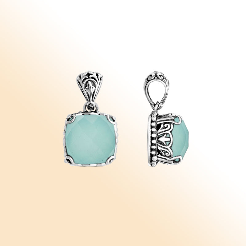 Elegant sterling silver pendant with cushion-cut green chalcedony quartz, Balinese handcrafted with scroll and bead carvings.
