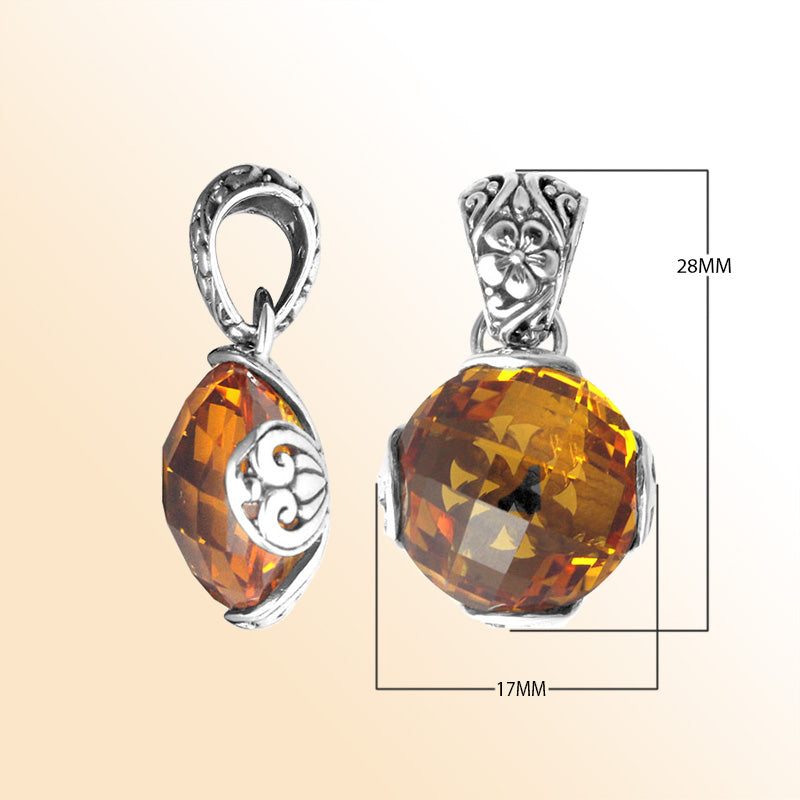 Handmade sterling silver pendant with faceted Citrine Quartz and Balinese floral swirl details, artisan crafted in Bali.