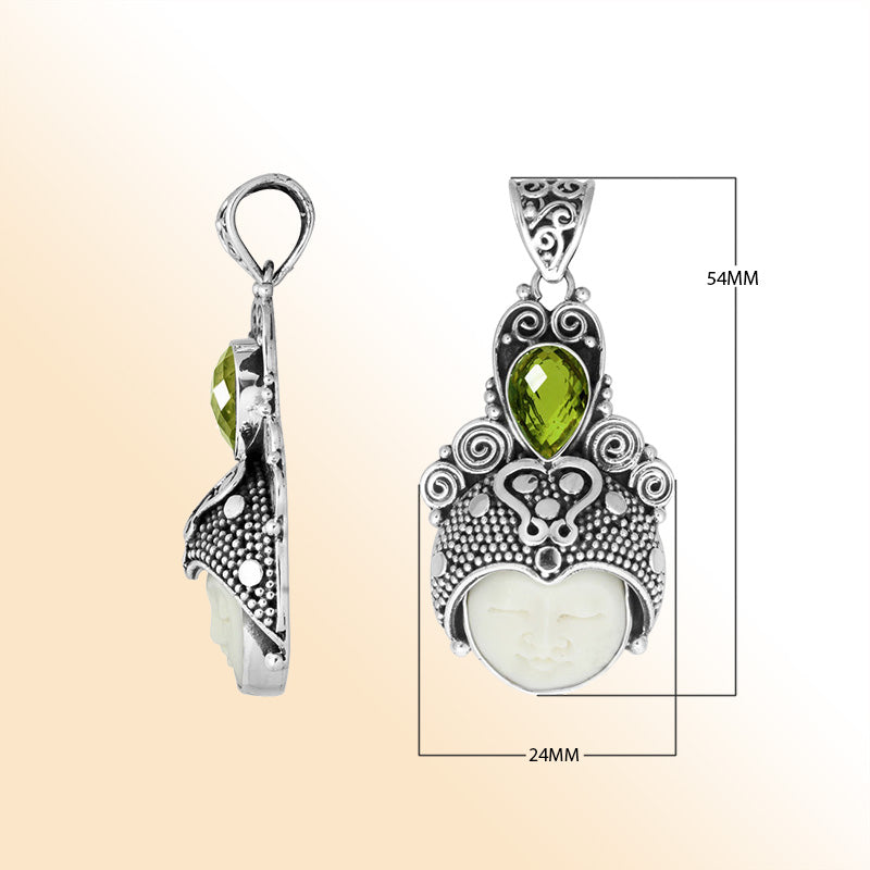 Balinese bone face pendant with peridot quartz in sterling silver, handcrafted jewelry.