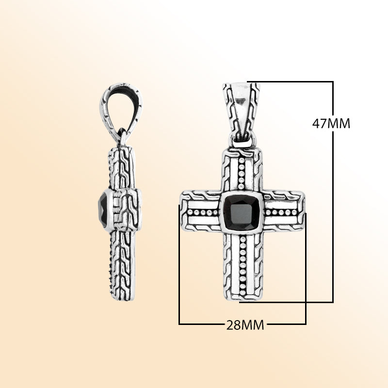 Silver cross pendant with black onyx stone in artistic design.