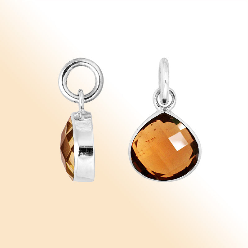 Sterling silver teardrop pendant with polished Citrine Quartz stone in golden glow
