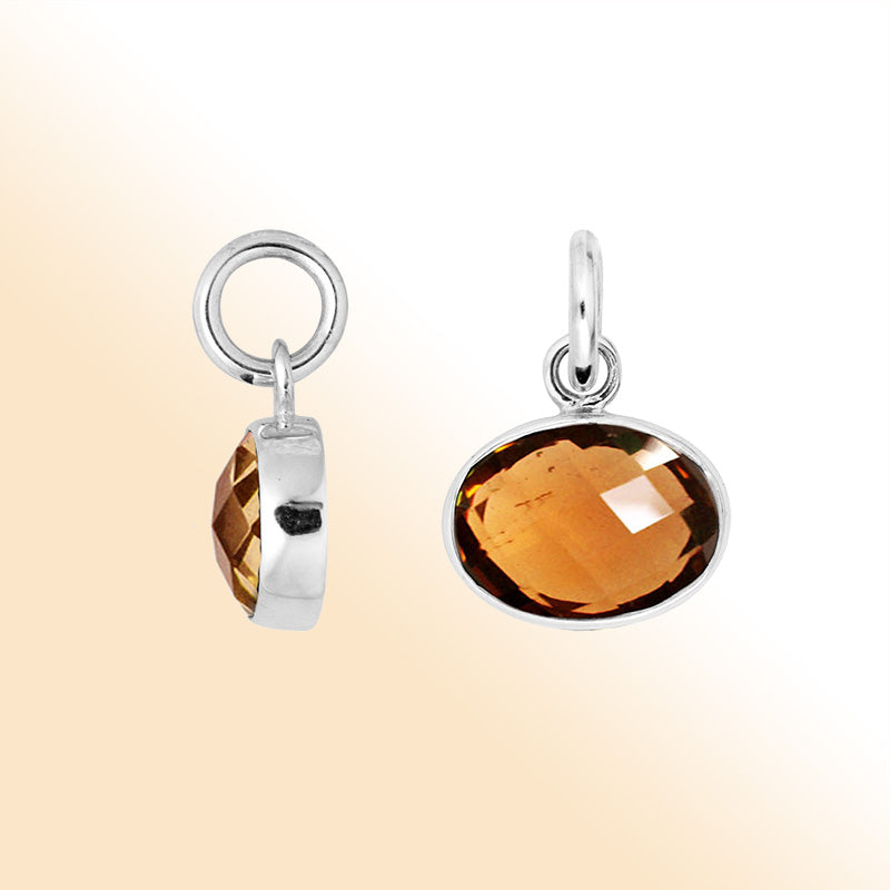 Oval Sterling Silver pendant with faceted Citrine Quartz stone