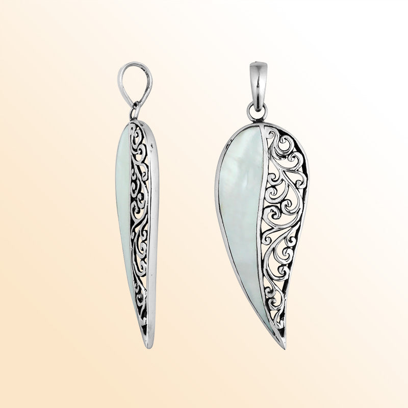 Sterling silver long leaf pendant with luminous mother of pearl and detailed Balinese filigree