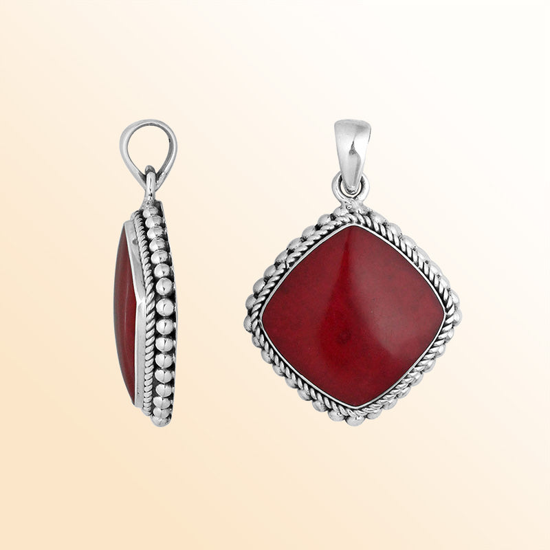Sterling silver cushion shape pendant with red coral and rope beaded silver border handcrafted in Bali