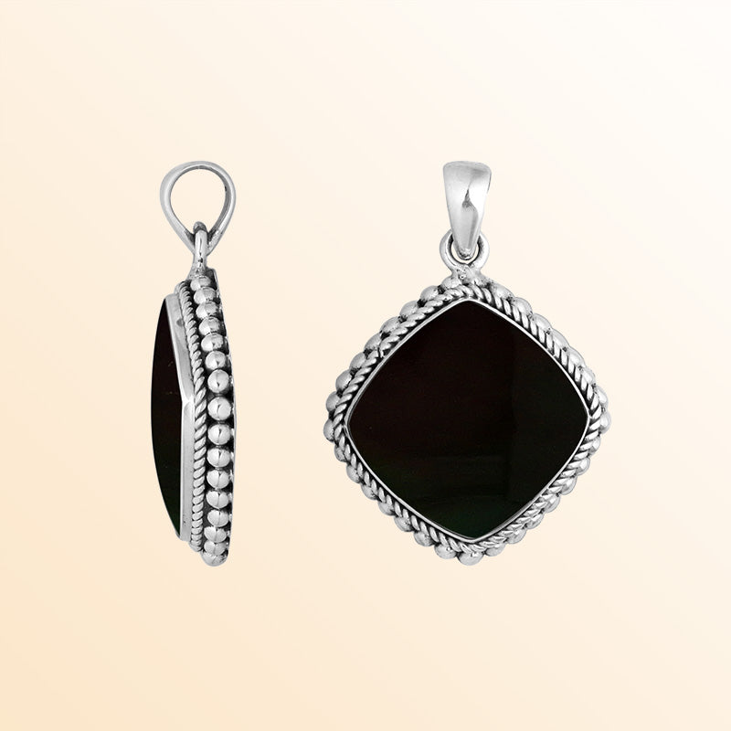 Sterling silver cushion shape pendant with black shell and rope beaded silver frame handcrafted in Bali