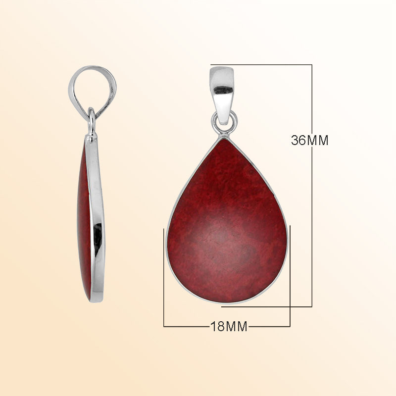 Sterling silver teardrop pendant with red coral and polished silver frame handcrafted in Bali