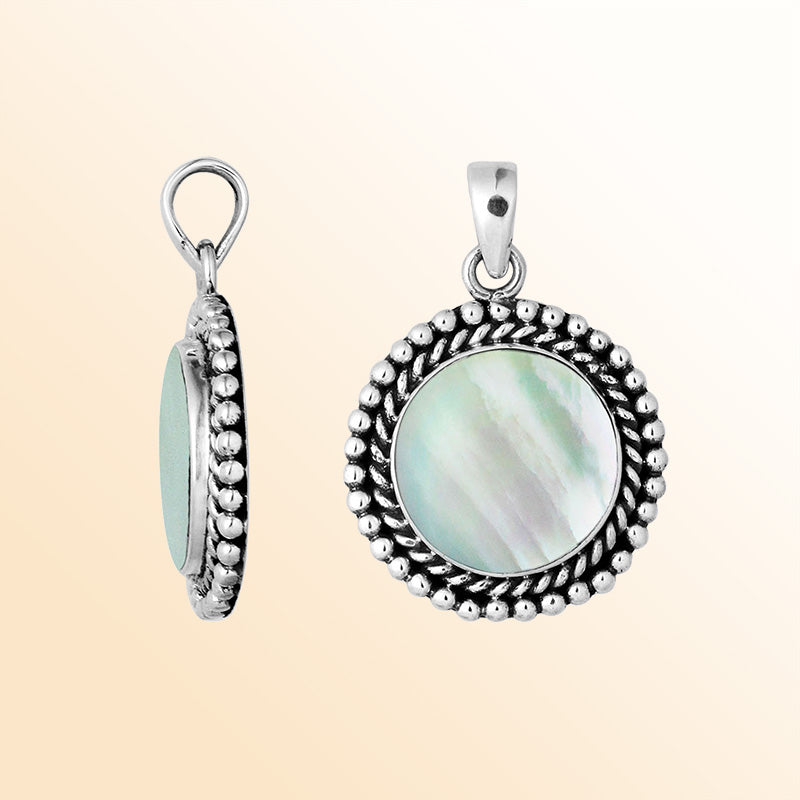 Sterling silver round pendant with mother of pearl and rope beaded silver frame handcrafted in Bali