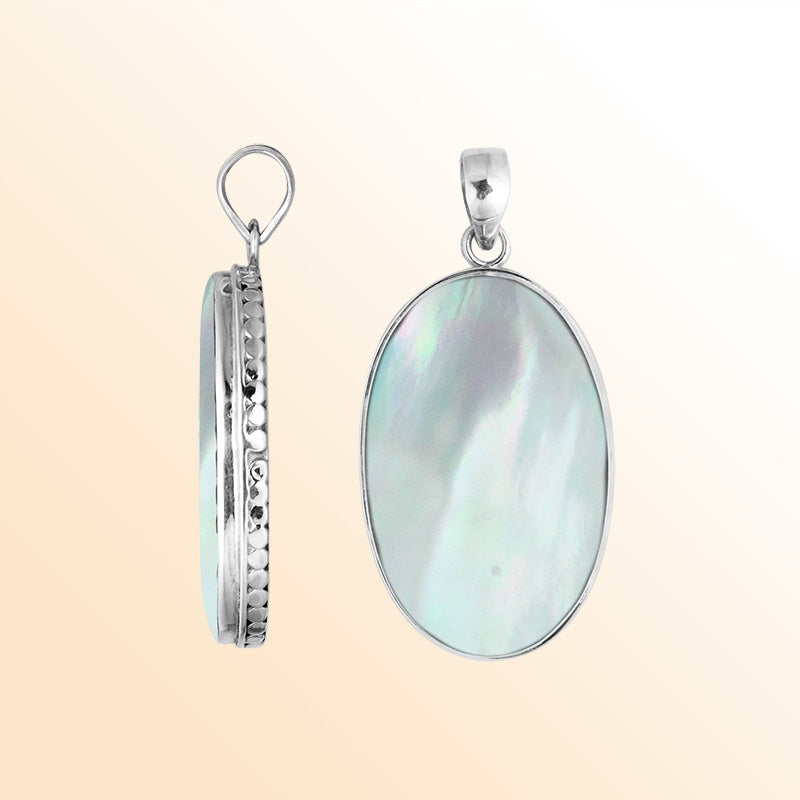 Sterling silver oval pendant with mother of pearl and hammered silver frame handcrafted in Bali