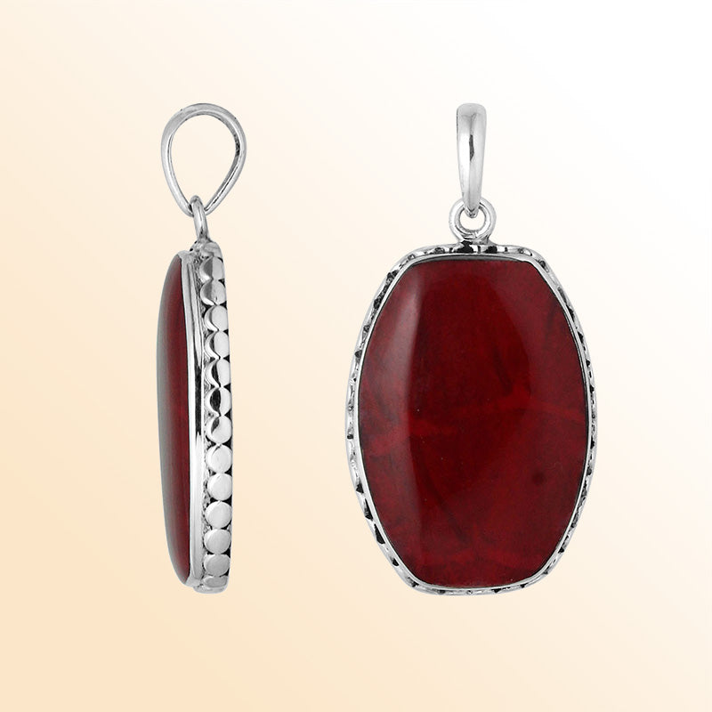 Sterling silver octagon pendant with red coral and hammered silver frame handcrafted in Bali