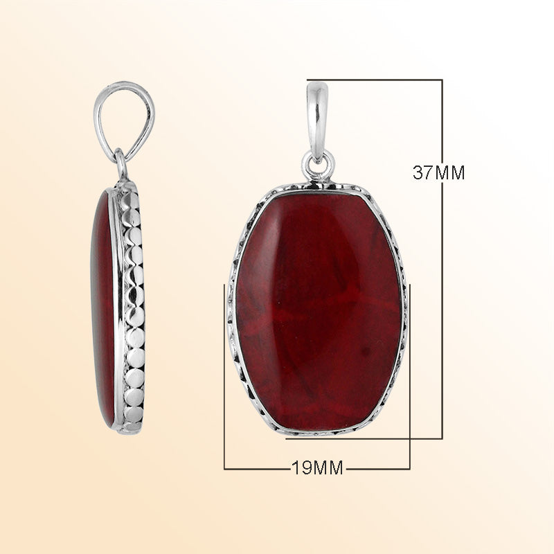 Sterling silver octagon pendant with red coral and hammered silver frame handcrafted in Bali