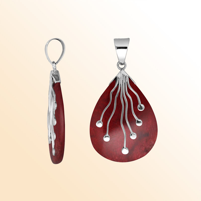 Sterling Silver Balinese Teardrop Shape Red Coral Pendant With Silver Wave Design