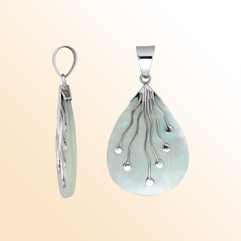Sterling Silver Balinese Teardrop Shape Mother Of Pearl Pendant With Silver Wave Design