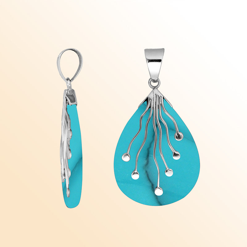 Sterling silver teardrop pendant with polished Turquoise Shell and flowing silver wire accents – handcrafted artisan jewelry for women.