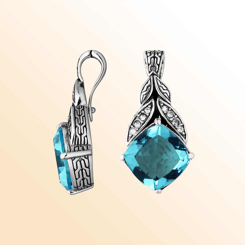 Sterling Silver Balinese Blue Topaz Quartz Pendant With Cubic Zirconia Leaf Design