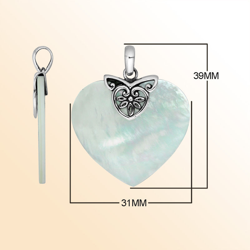 Handcrafted Sterling Silver Balinese Heart Pendant featuring lustrous Mother Of Pearl framed in detailed filigree silver work, designed for women who value timeless artistry and elegant jewelry craftsmanship.