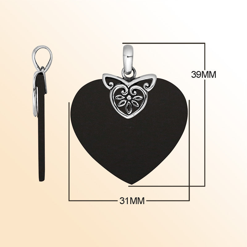 Handcrafted Balinese Sterling Silver Heart Pendant with lustrous Black Shell and delicate silver filigree detailing, designed for women who appreciate handcrafted artistry and refined jewelry elegance.