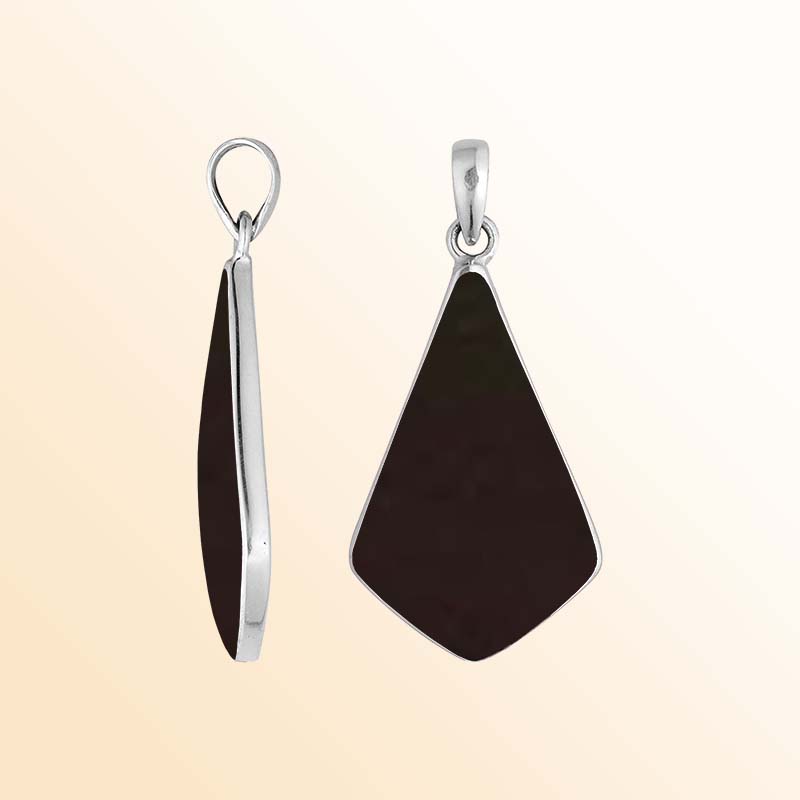 Sterling silver Shadow Crest pendant with smooth Black Shell inlay and bold sculptural shield silhouette