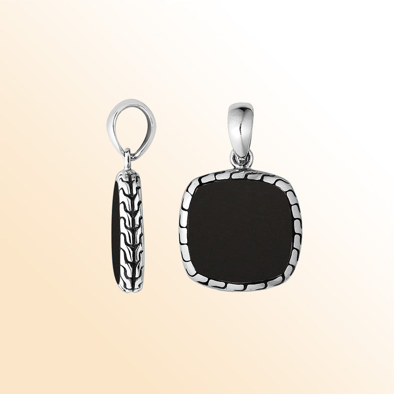 Handcrafted Sterling Silver Black Shell Cushion Pendant With Balinese Frame Design.
