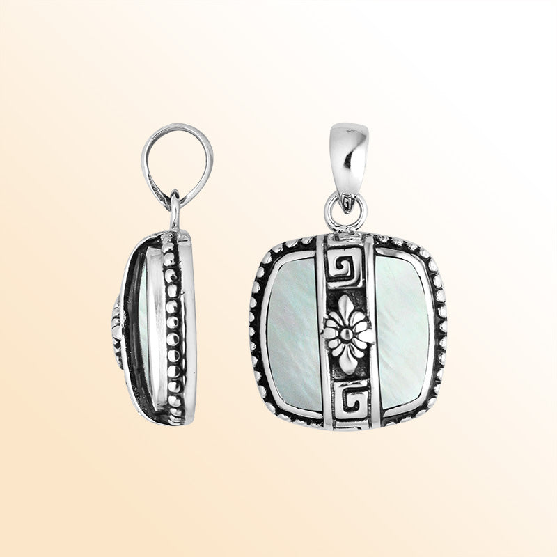 Elegant Sterling Silver Mother Of Pearl square pendant handcrafted with Balinese floral detailing, mirror-polished finish, and radiant white sheen for women’s fine jewelry collections.
