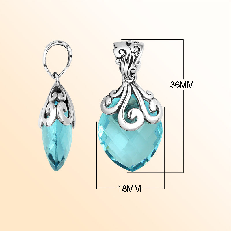 Elegant Sterling Silver Blue Topaz Quartz marquise pendant featuring handcrafted swirl filigree detailing, mirror-polished surface, and bright aqua-blue brilliance for women’s artistic jewelry collections.